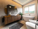 Modernes Badezimmer mit freistehender Badewanne, runden Spiegel und Holzwaschtisch