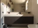 INTERIOS. Il tuo studio di interior design. Bagno moderno con lavabo, mobile nero e grande specchio