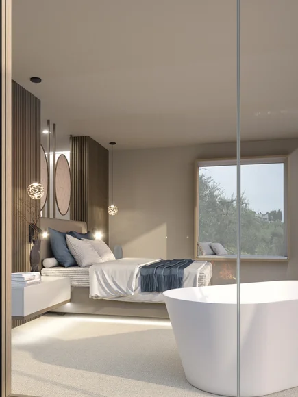 Modernes Schlafzimmer mit freistehender Badewanne und großem Fenster